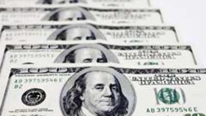 Dólar tem viés de queda com alívio externo e expectativa por decisões de política monetária