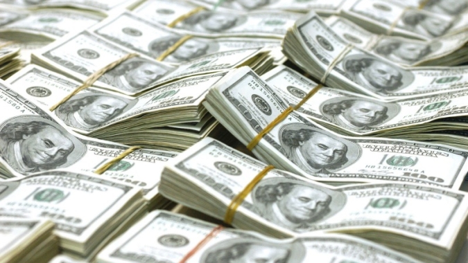 Dólar sustenta leves ganhos no Brasil em dia de correção e leilão do BC