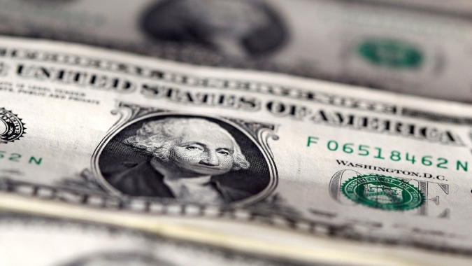 Dólar ronda estabilidade frente ao real após PIB dos EUA e IPCA-15