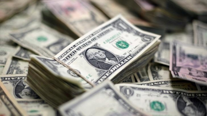Dólar à vista desacelera baixa após fala de Lula sobre déficit zero, juros futuros sobem