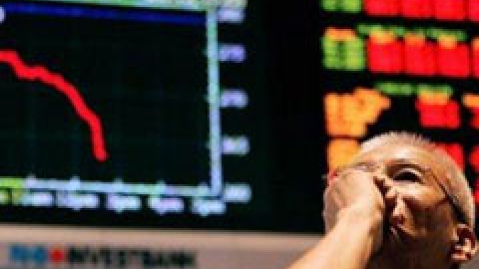 Futuros recuam com foco voltado para Fed