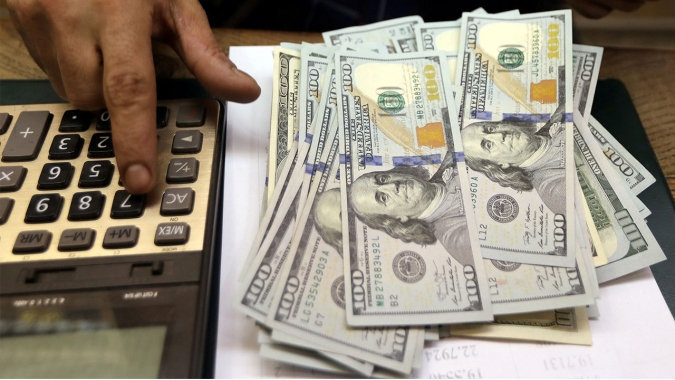 Dólar sobe no Brasil com investidores à espera de decisão de BC e Fed
