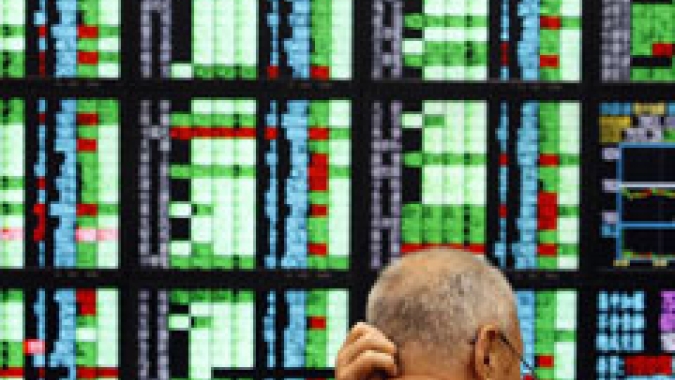 Ações da China têm volatilidade e fecham em leve queda após vendas
