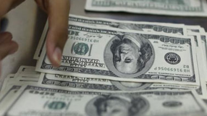 Dólar tem instabilidade frente ao real após tom duro do Copom
