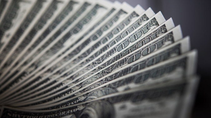 Dólar sobe em dia negativo para ativos brasileiros e de expectativa sobre juros