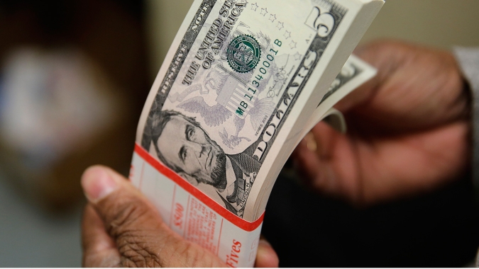 Dólar tem pouca alteração frente ao real antes de dados econômicos