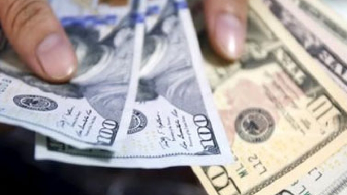 Dólar avança ante real em linha com cautela externa