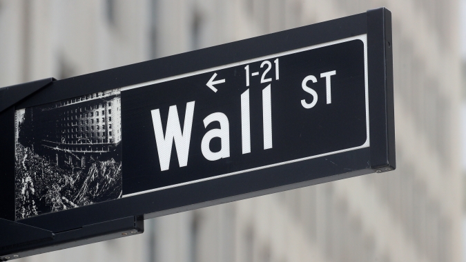 Wall St abre em leve baixa antes de dados e comentários de membros do Fed